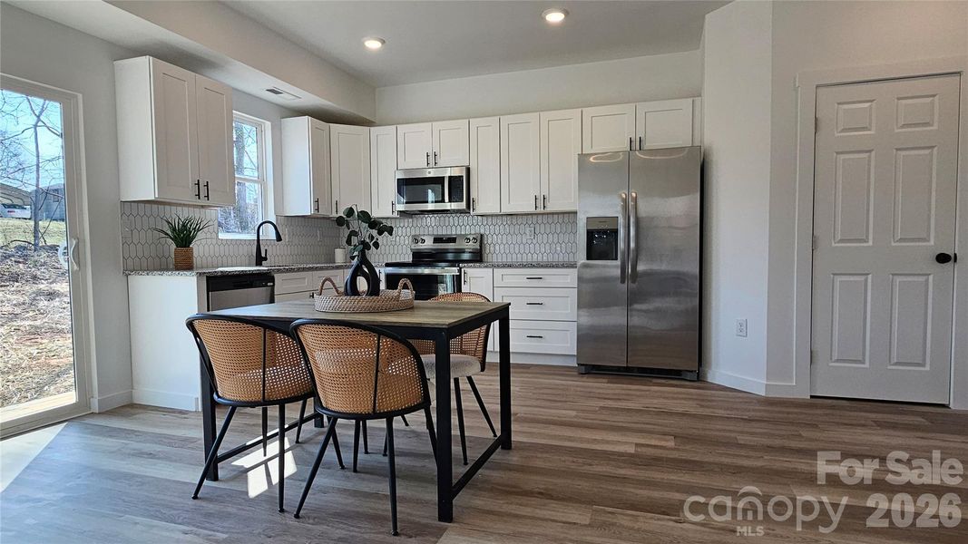 Furnished interior view inside a new home in , Hickory (Image 16).