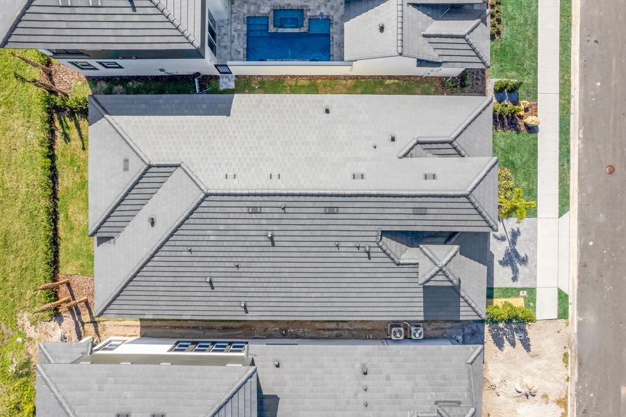 Representative exterior photo of a completed home built from the Marbella by ABD Development in Hampton Green at Providence, Davenport, FL (Image 26).