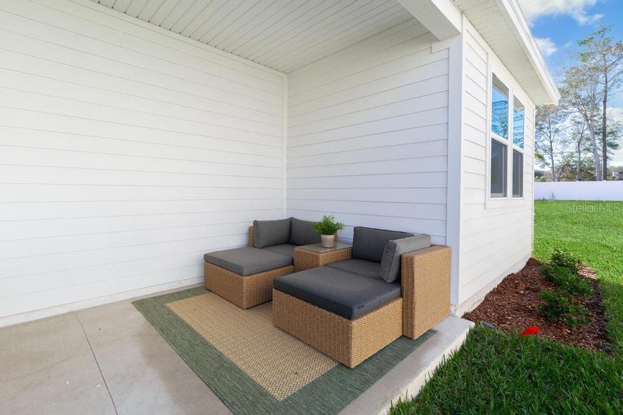 Furnished interior view inside a new home in The Cypress Series at Reserve East, Flagler Beach (Image 14).