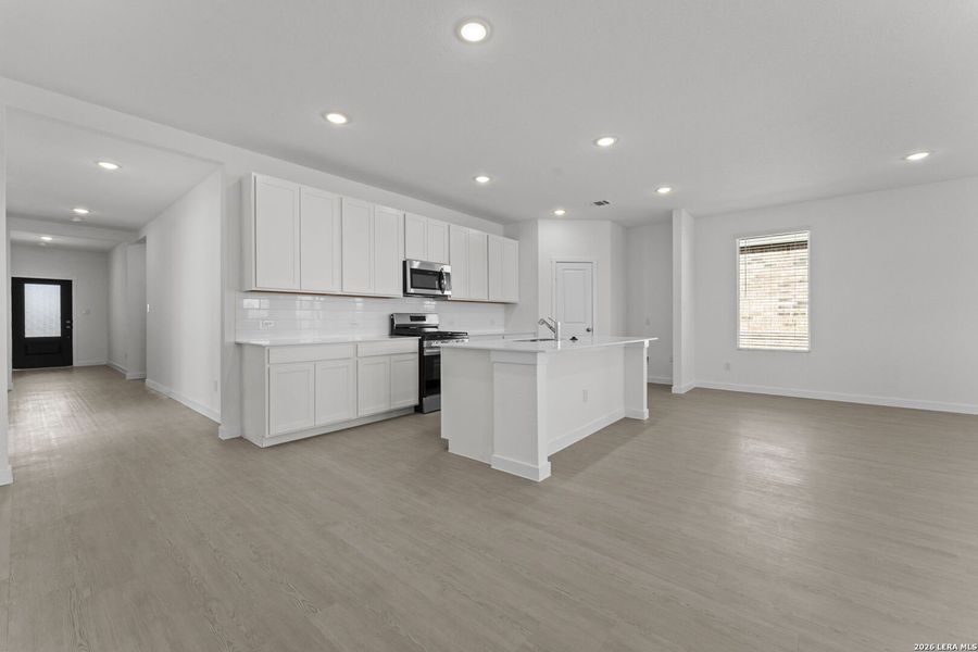 Furnished interior view inside a new home in Voss Farms, New Braunfels (Image 6).