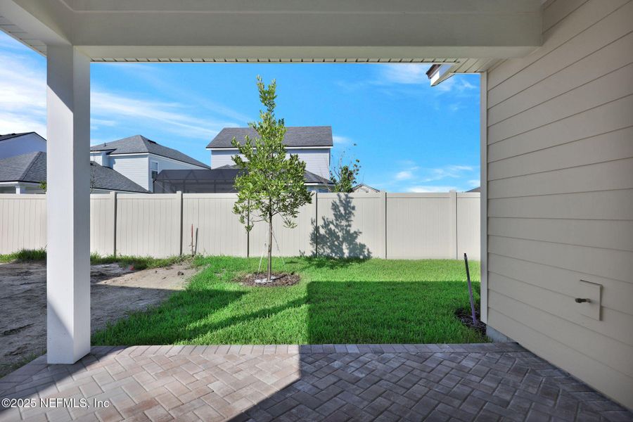 Exterior details and patio area of a home in Crosswinds at Nocatee, Ponte Vedra Beach (Image 29). Exterior details and patio area of a home in Crosswinds at Nocatee, Ponte Vedra Beach (Image 29).