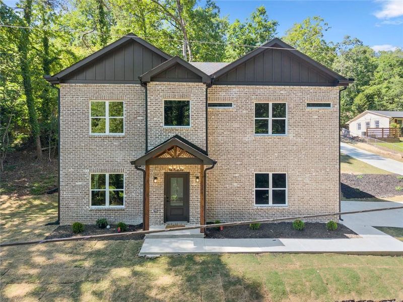 Front exterior of a new home in , Gainesville, GA, highlighting curb appeal (Image 24).