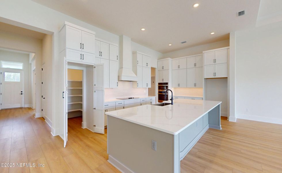 Furnished interior view inside a new home in Amelia National, Fernandina Beach (Image 4).