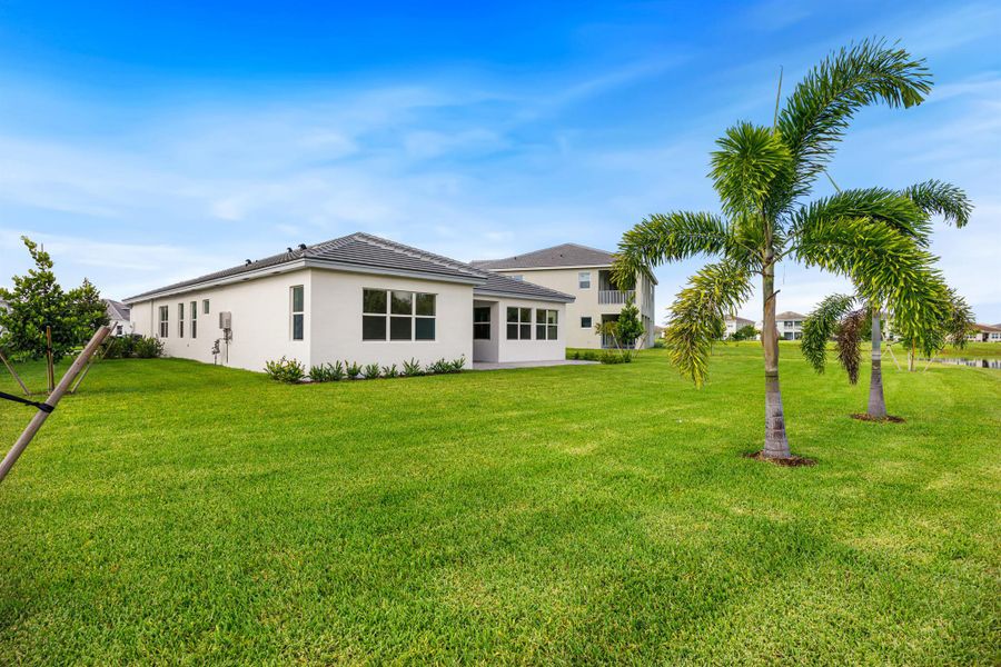 Front exterior of a new home in , Westlake, FL, highlighting curb appeal (Image 25). Front exterior of a new home in , Westlake, FL, highlighting curb appeal (Image 25).