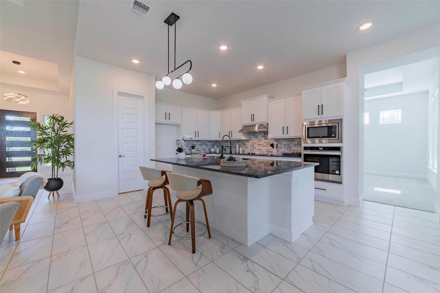 Furnished interior view inside a new home in Spicewood Trails, Spicewood (Image 30). Furnished interior view inside a new home in Spicewood Trails, Spicewood (Image 30).