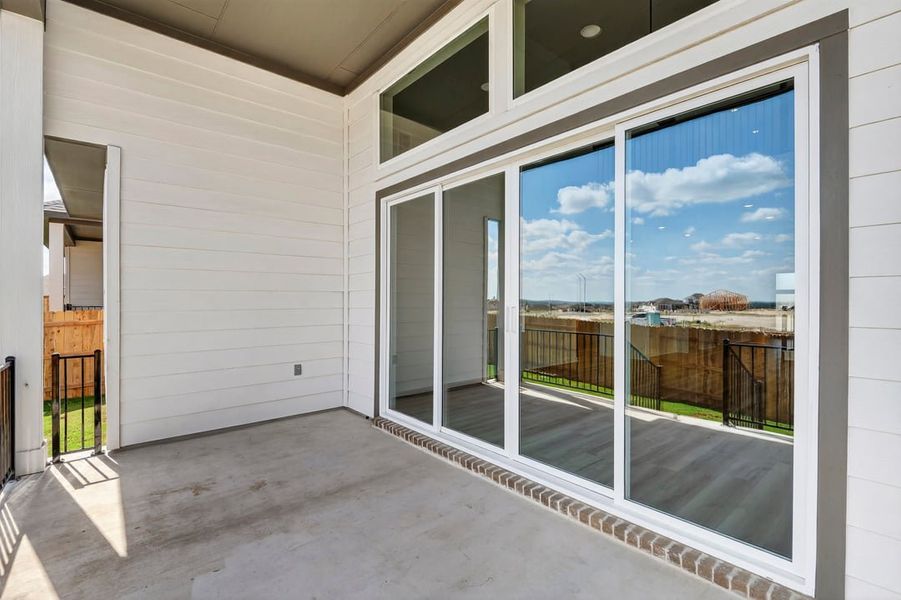 Exterior details and patio area of a home in Arbor Collection at Lariat, Liberty Hill (Image 22). Exterior details and patio area of a home in Arbor Collection at Lariat, Liberty Hill (Image 22).