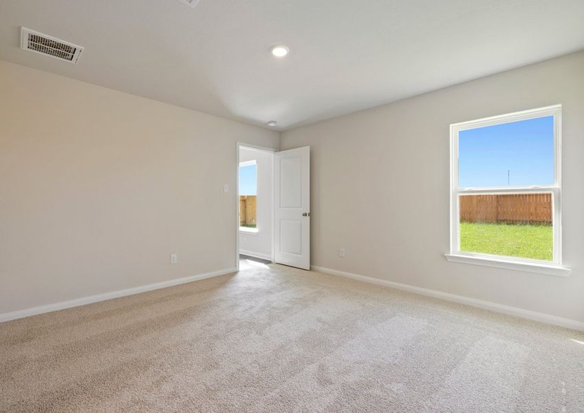 Master bedroom with a ceiling fan Master bedroom with a ceiling fan