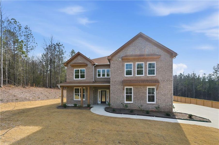 Front exterior of a new home in , Griffin, GA, highlighting curb appeal (Image 32). Front exterior of a new home in , Griffin, GA, highlighting curb appeal (Image 32).