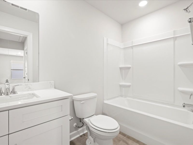 Furnished interior view inside a new home in Creek Ridge - Heritage Collection, Spartanburg (Image 6).