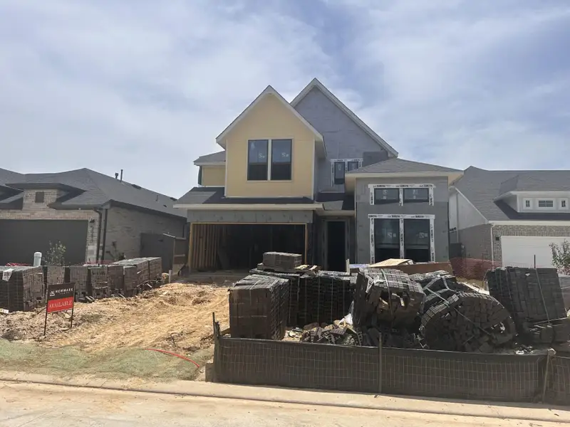 Front exterior of a new home in Jubilee 45' 70', Hockley, TX, highlighting curb appeal (Image 9).
