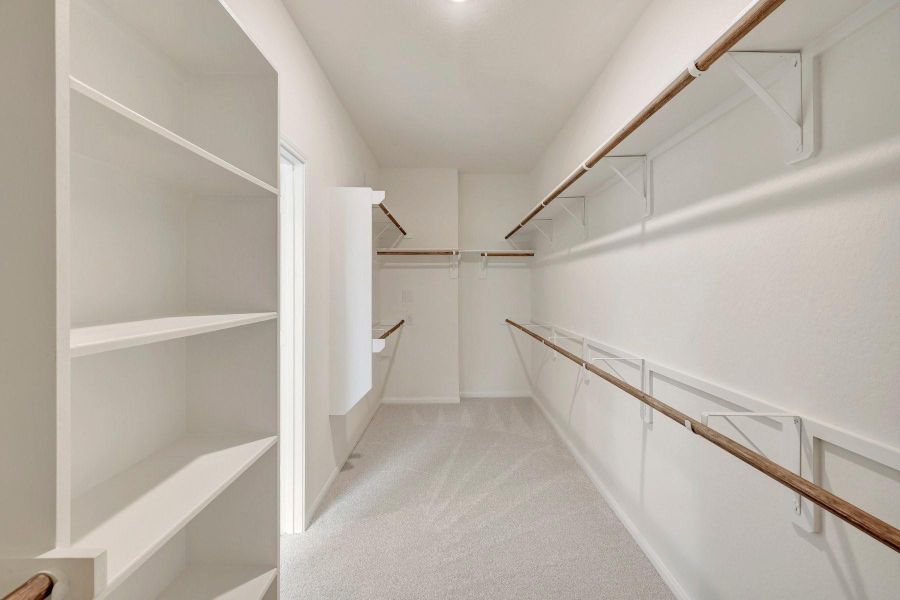 Walk-in closet in the owner's suite Walk-in closet in the owner's suite