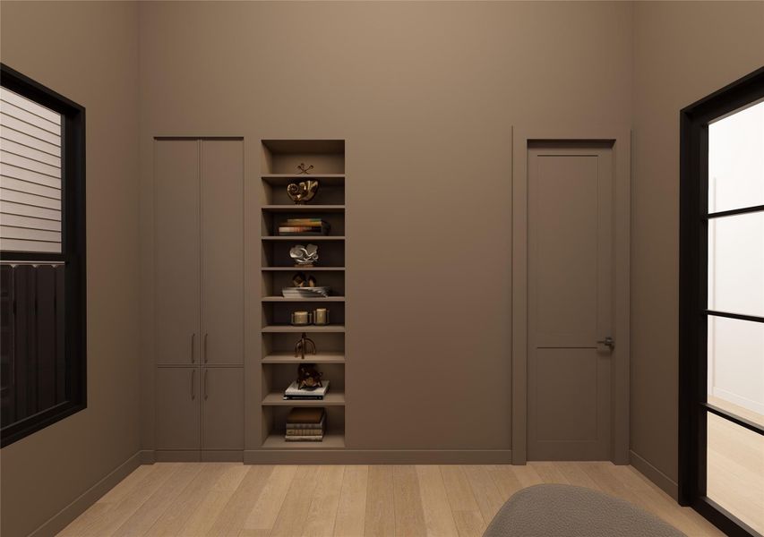 A thoughtfully designed flex space that balances form and function, featuring custom built-in shelving and concealed storage for a clean, tailored look. Soft neutral tones and natural light create a calm backdrop—ideal for a home office, reading lounge, or quiet retreat. A thoughtfully designed flex space that balances form and function, featuring custom built-in shelving and concealed storage for a clean, tailored look. Soft neutral tones and natural light create a calm backdrop—ideal for a home office, reading lounge, or quiet retreat.
