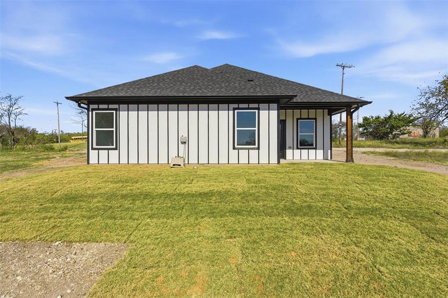 Exterior details and patio area of a home in , Tom Bean (Image 3).