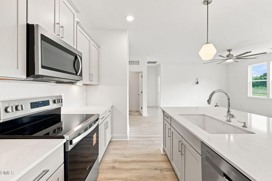 Furnished interior view inside a new home in The Cottages at 78 North, Sanford (Image 13).
