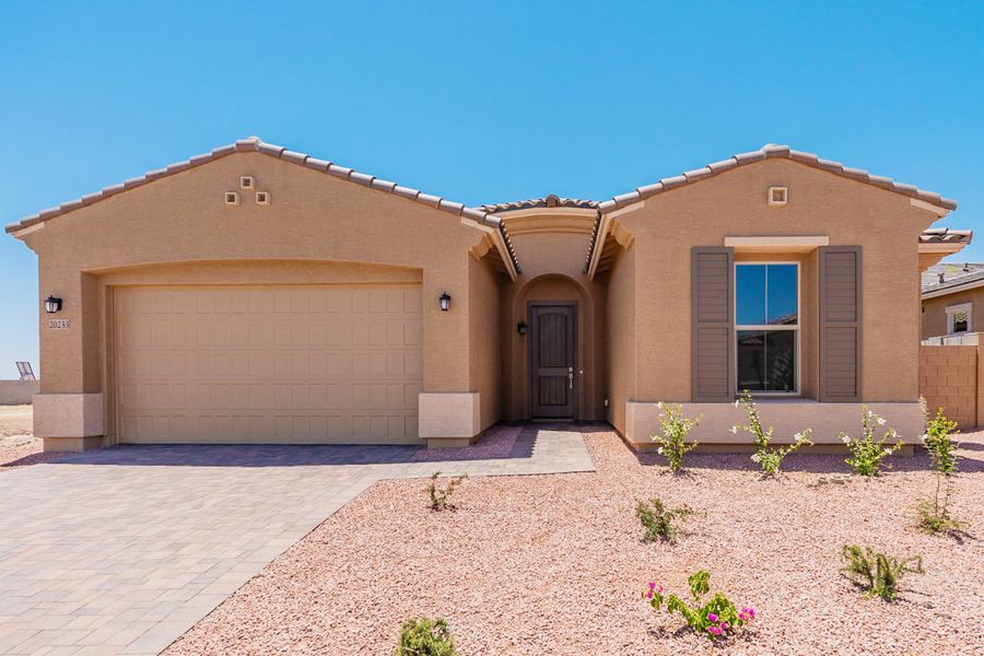 Front exterior of a new home in Mirada Crossing, Goodyear, AZ, highlighting curb appeal (Image 1).