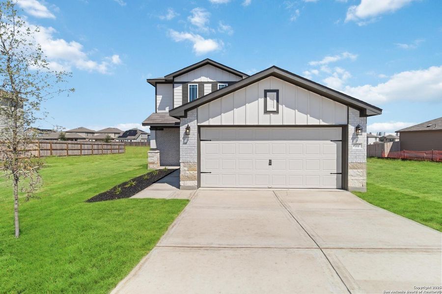 Front exterior of a new home in Willow Point, San Antonio, TX, highlighting curb appeal (Image 2). Front exterior of a new home in Willow Point, San Antonio, TX, highlighting curb appeal (Image 2).