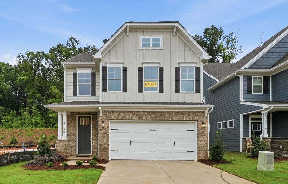 Front exterior of a new home in Caldwell Forest, Charlotte, NC, highlighting curb appeal (Image 2). Front exterior of a new home in Caldwell Forest, Charlotte, NC, highlighting curb appeal (Image 2).