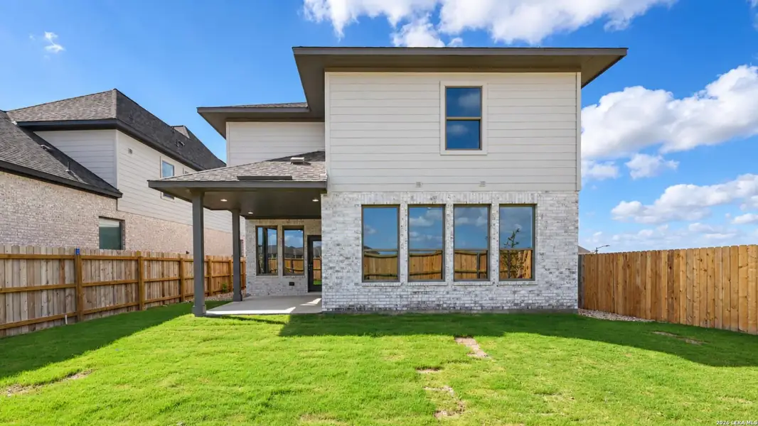 Exterior details and patio area of a home in Legacy at Lake Dunlap, New Braunfels (Image 17).