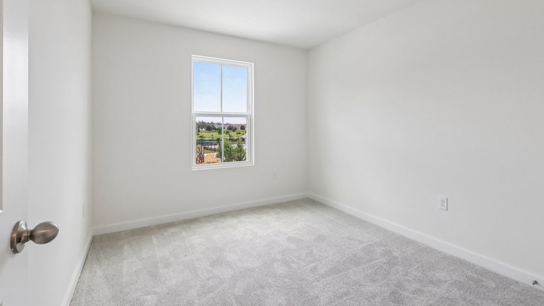 Furnished interior view inside a new home in Cyrene at Harmony, St. Cloud (Image 23).
