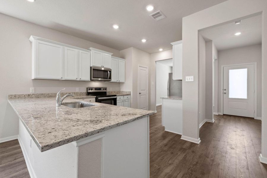 Furnished interior view inside a new home in Vacek Country Meadows, Richmond (Image 7).