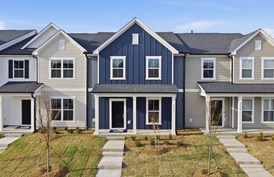 Front exterior of a new home in Saunders Farm, Willow Spring, NC, highlighting curb appeal (Image 2). Front exterior of a new home in Saunders Farm, Willow Spring, NC, highlighting curb appeal (Image 2).