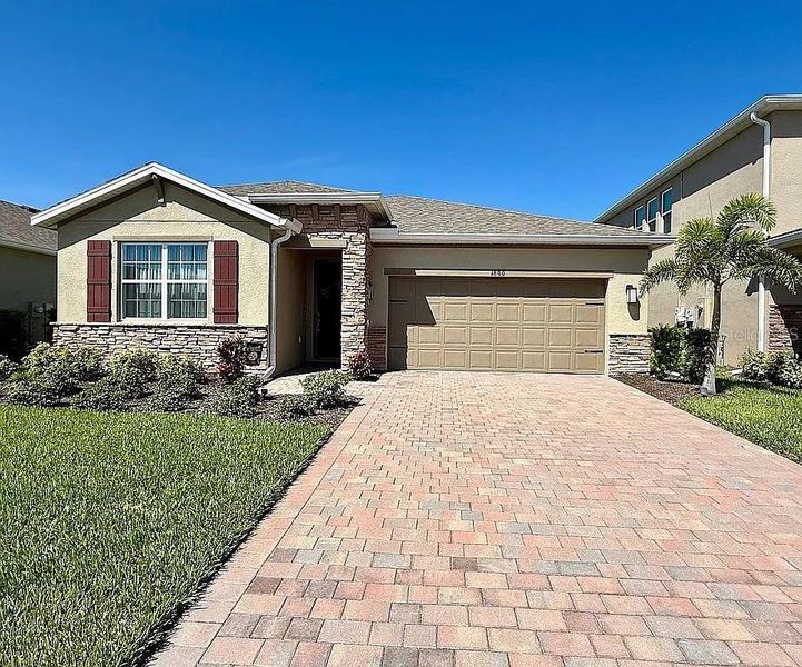 Front exterior of a new home in , Port Charlotte, FL, highlighting curb appeal (Image 1). Front exterior of a new home in , Port Charlotte, FL, highlighting curb appeal (Image 1).