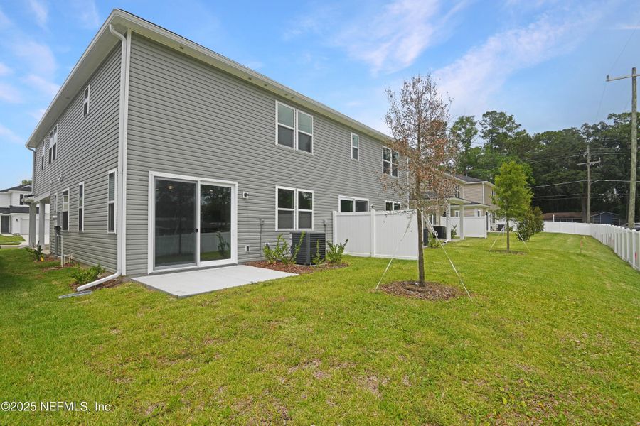 Exterior details and patio area of a home in Seasons at Park Trace, Jacksonville (Image 3).