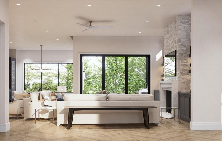 Designed to showcase effortless indoor-outdoor flow, this light-filled living area is styled with soft-toned seating and elegant finishes. Floor-to-ceiling windows frame the greenery beyond, while a stone fireplace and herringbone flooring set a tone of modern refinement. This visual captures the potential for an inviting, tranquil gathering space.