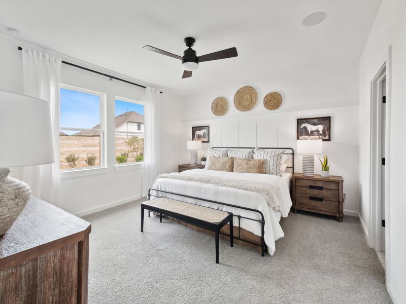 Primary suite with decorative feature wall Primary suite with decorative feature wall