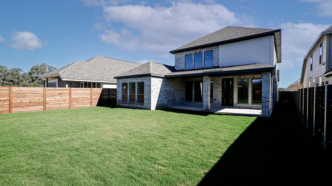 Exterior details and patio area of a home in Juniper Springs, Lockhart (Image 24).