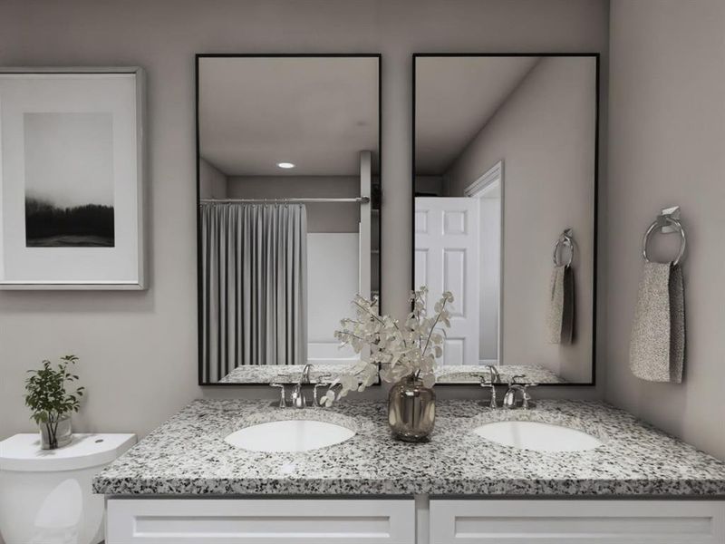 Full bath featuring a shower with shower curtain, toilet, double vanity, and a sink Full bath featuring a shower with shower curtain, toilet, double vanity, and a sink