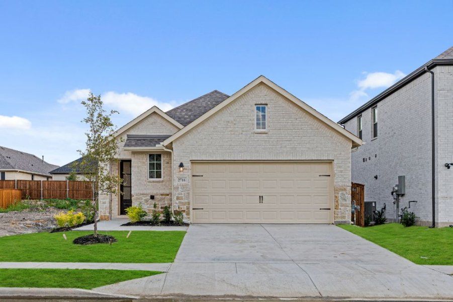 Representative exterior photo of a completed home built from the Chisholm by UnionMain Homes in Reunion, Rhome, TX (Image 5). Representative exterior photo of a completed home built from the Chisholm by UnionMain Homes in Reunion, Rhome, TX (Image 5).