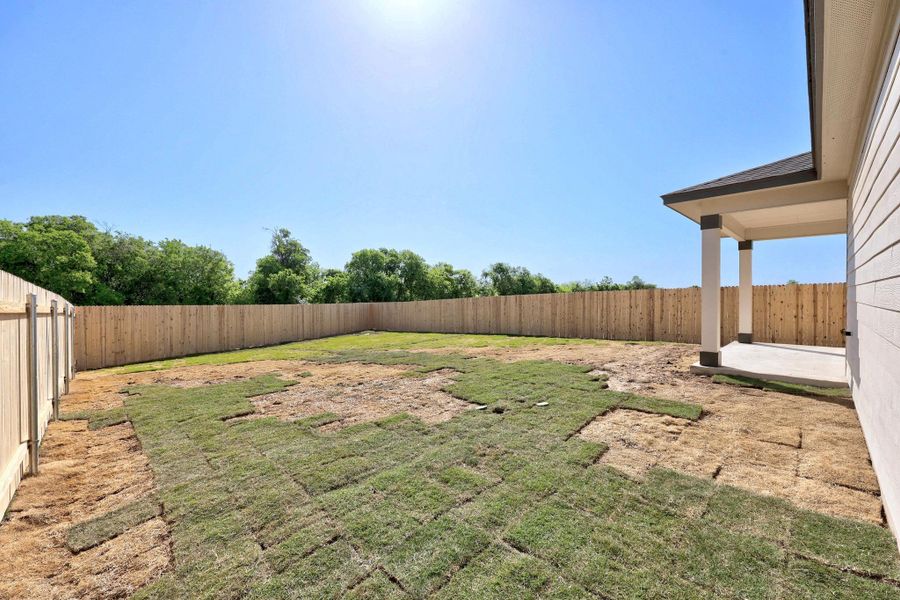 Exterior details and patio area of a home in Overlook Ranch, Georgetown (Image 22). Exterior details and patio area of a home in Overlook Ranch, Georgetown (Image 22).