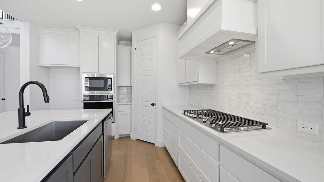 Furnished interior view inside a new home in Mosaic, Celina (Image 12).