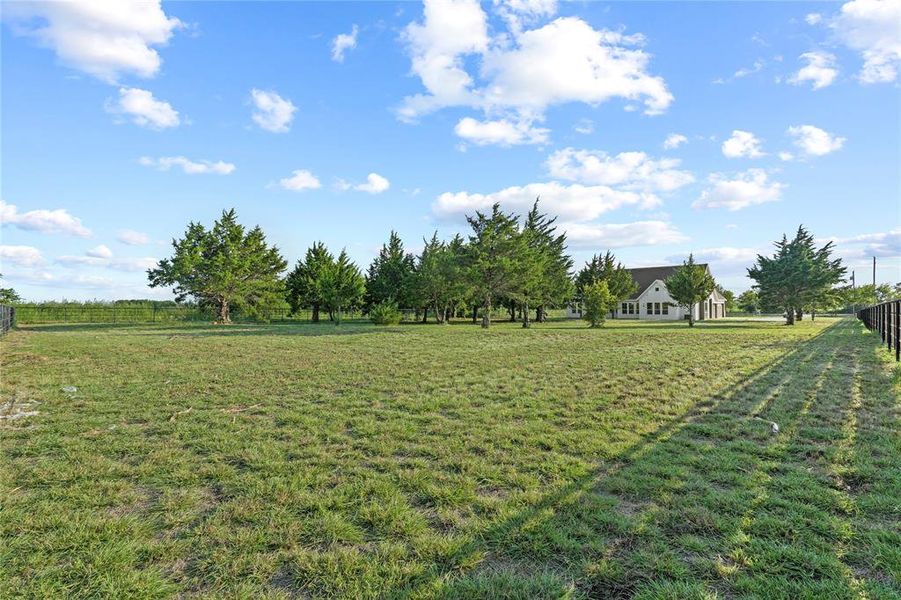 View of yard featuring a rural view View of yard featuring a rural view