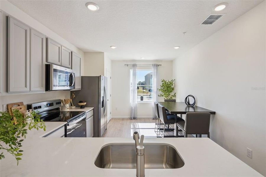 Furnished interior view inside a new home in Oak Pointe, Apopka (Image 5).