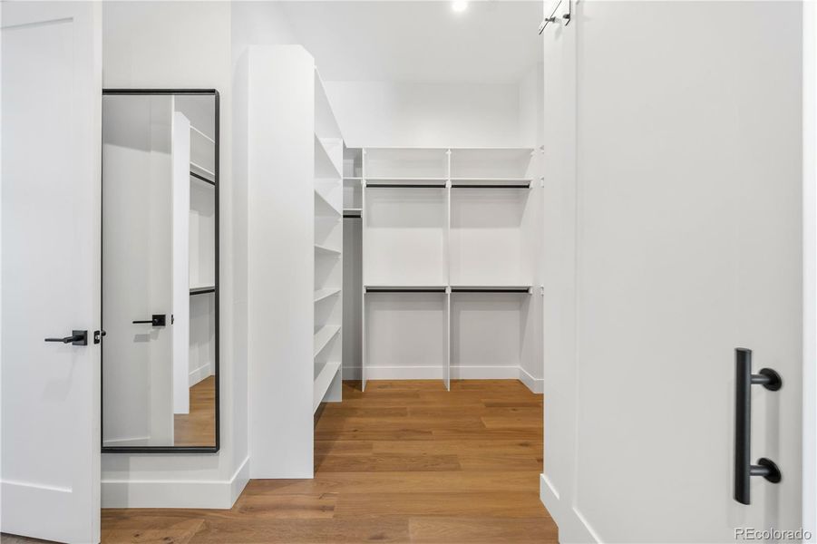 Primary Closet- Opening to Laundry