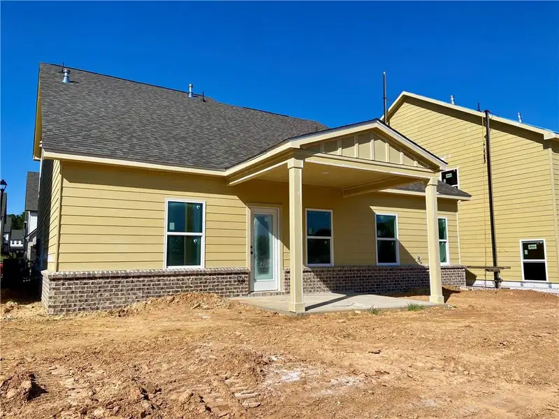Exterior details and patio area of a home in Eastlyn Crossing, Flowery Branch (Image 3).