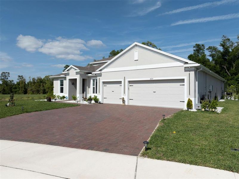 Front exterior of a new home in , Mount Dora, FL, highlighting curb appeal (Image 22).