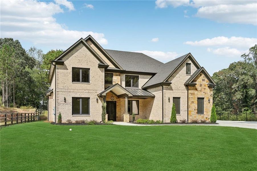 Front exterior of a new home in , Lawrenceville, GA, highlighting curb appeal (Image 25).