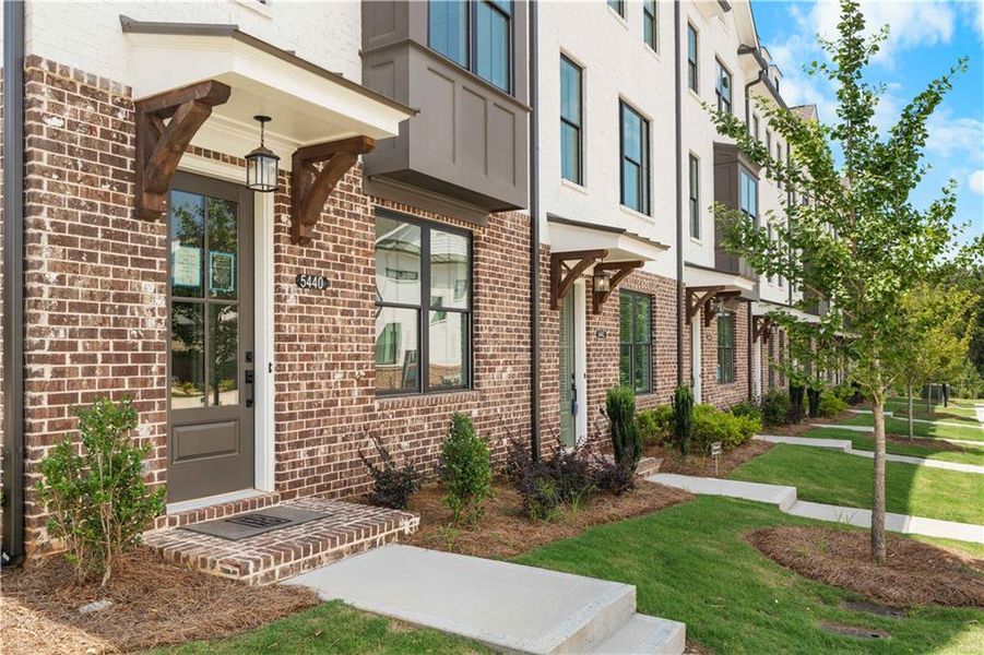 Front exterior of a new home in Millcroft Townhomes, Buford, GA, highlighting curb appeal (Image 38).