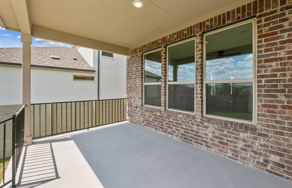 Exterior details and patio area of a home in Wolf Ranch, Georgetown (Image 27).