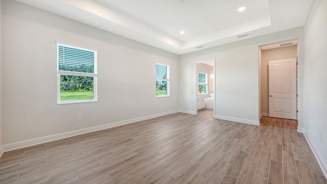 Spacious, unfurnished interior of a new home in Canoe Creek Real Estate and Homes for Sale in Parrish, FL - Neal Communities, Parrish (Image 52).
