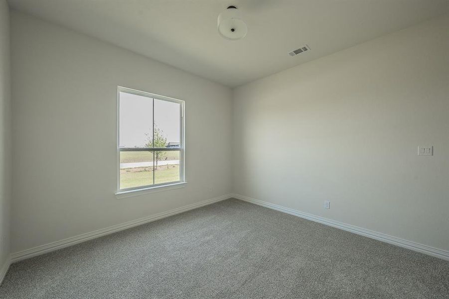 Spacious, unfurnished interior of a new home in Matthews Farms, Venus (Image 33).