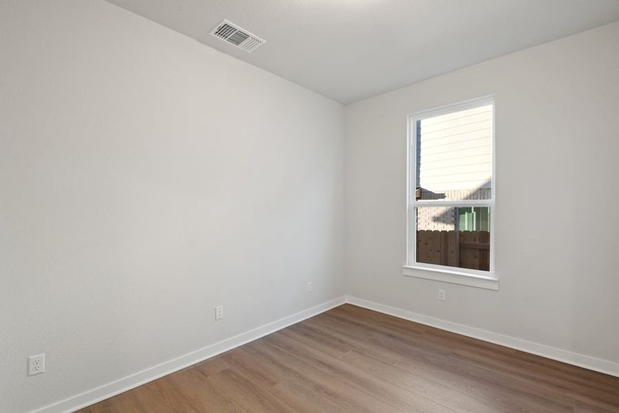 Spacious, unfurnished interior of a new home in Terrace Collection at Lariat, Liberty Hill (Image 20).