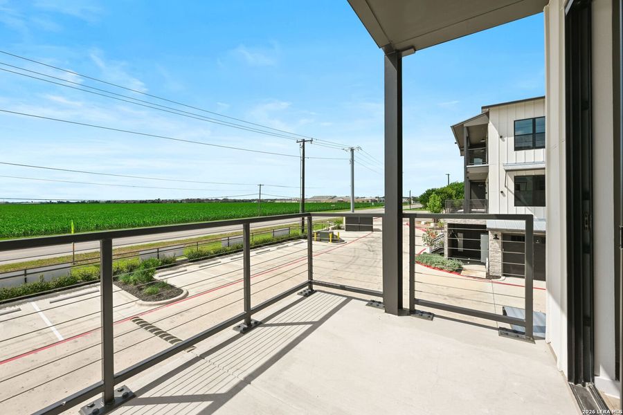 Exterior details and patio area of a home in , New Braunfels (Image 18).