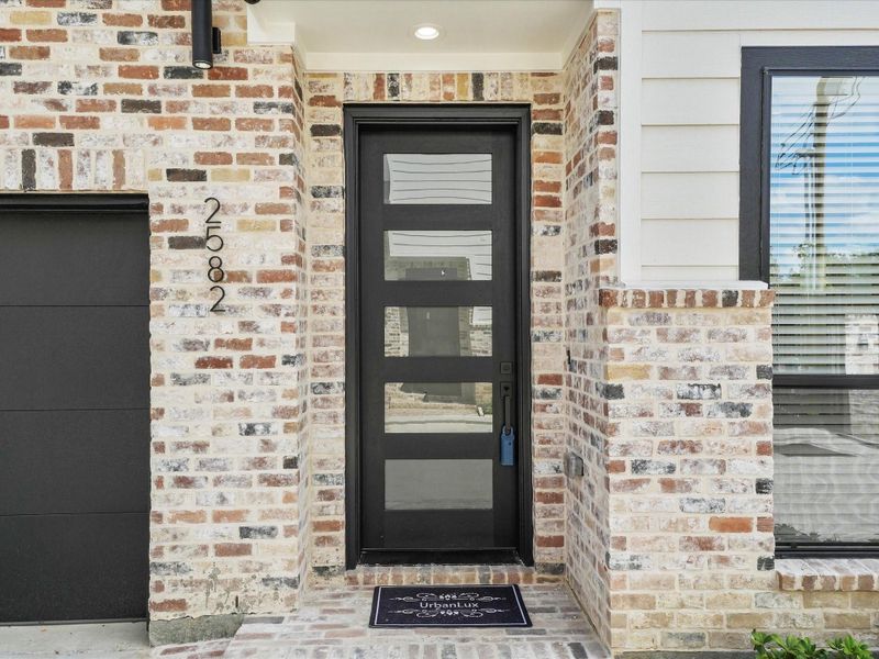 Exterior details and patio area of a home in , Houston (Image 3).