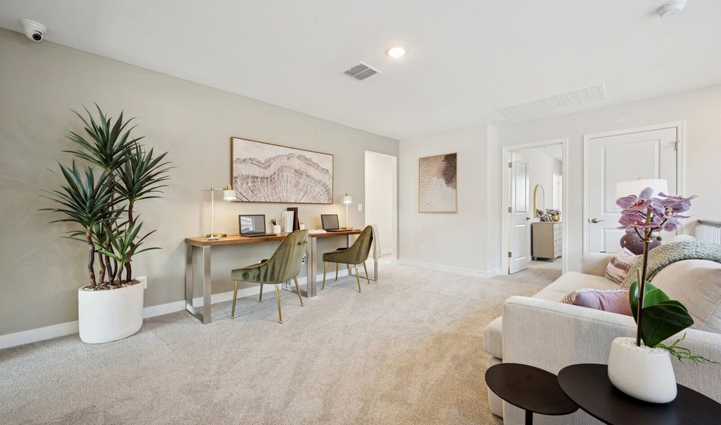 Versatile loft space to use as a media room or hang-out spot