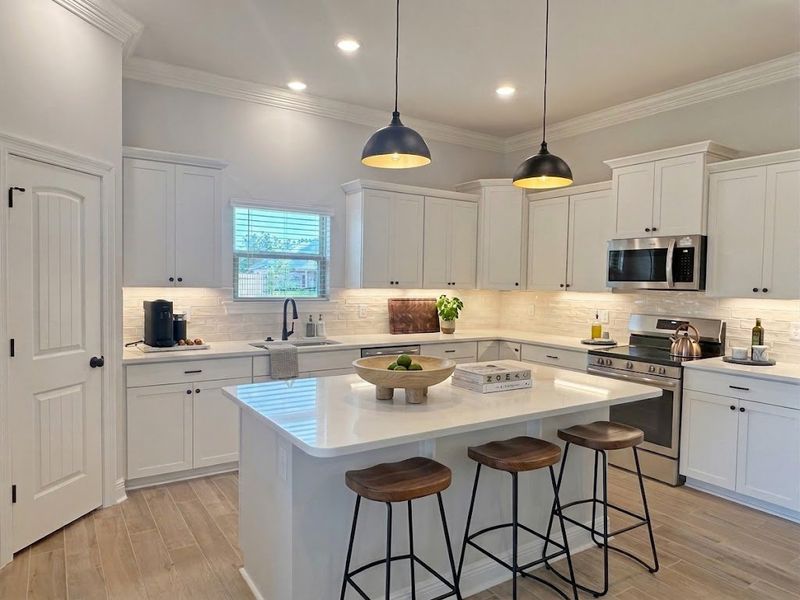Furnished interior view inside a new home in Bird Song at Hammock Bay, Freeport (Image 3).