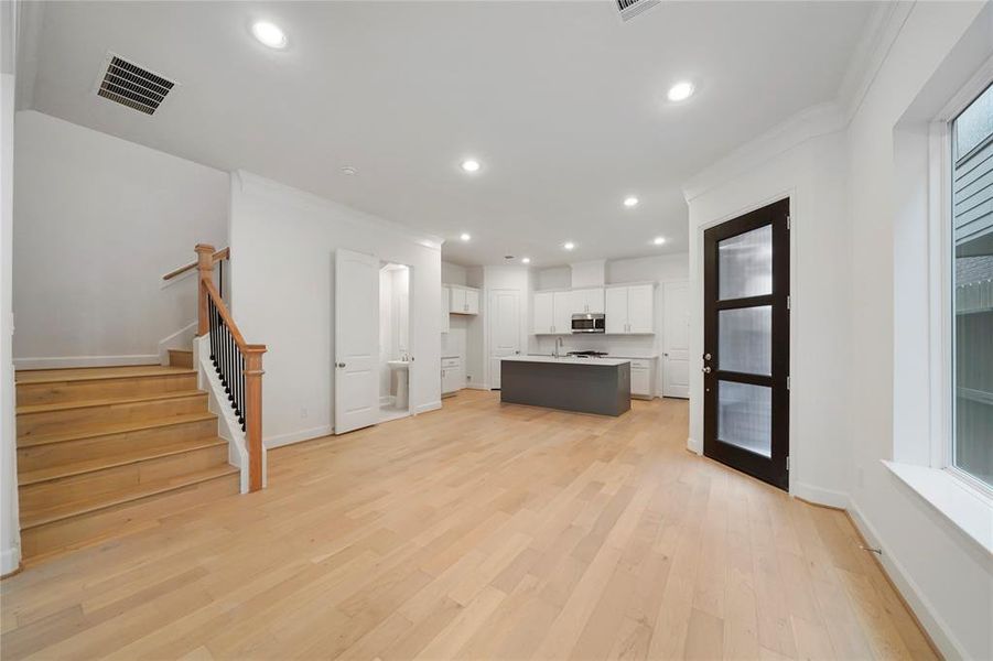 The Chesapeake Kitchen seamlessly transitions into the dining room & living room. (Sample photos of a completed Chesapeake floor plan. The image may feature alternative selections and/or upgrades.)